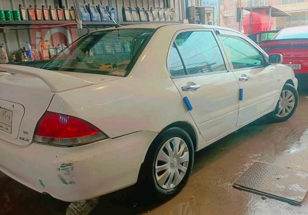 ميتسوبيشي لانسرEX